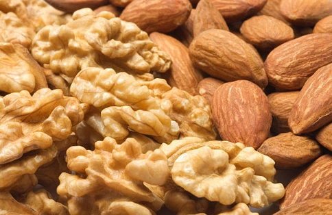 Soaked almonds and walnuts as part of my daily healthy diet to support heart health and improve HDL cholesterol naturally.