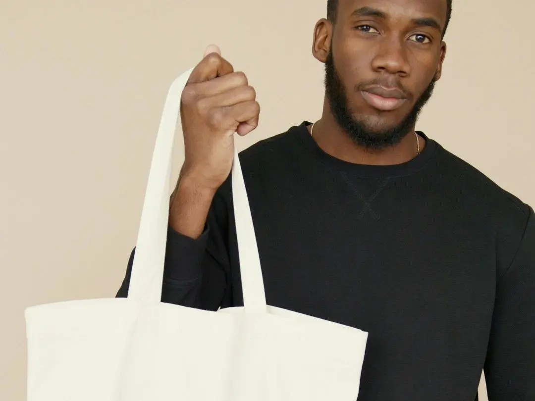 Mindful shopping with a list and cloth bag to reduce unnecessary expenses and save money